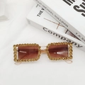Macro detail of rectangle sunglasses with gold rhinestones and brown gradient lenses - Champagne