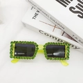 Macro detail of retro square sunglasses featuring neon green frames with rhinestones - Neon Yellow