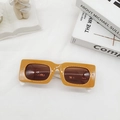 Detail of retro mustard yellow rectangle sunglasses with contrasting white temples - Yellow