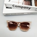 Detail view of champagne square sunglasses with brown gradient lenses and rice nail rivets - Champagne