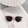 Detailed view of cream TR90 frames with technical specifications printed on the inner temple - Beige