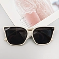 Lunettes de soleil polarisées enfant avec monture en silicone blanc crème et verres noirs - Beige