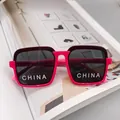 Kids square sunglasses featuring rose pink frames and protective dark lenses - Rose Red