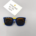 Flat lay of polarized kids sunglasses in vibrant blue and yellow contrast frame - Royal Blue Frame Yellow Legs