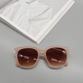 Retro oval sunglasses with translucent light pink frames and brown gradient lenses - Milk Tea