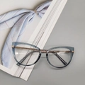 Cat-eye TR90 blue light blocking glasses in translucent grey-blue with gold temples - Smoke Gray