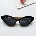 Cat eye sunglasses for women with black frames and decorative golden metal chains - Black
