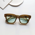Kids' square sunglasses in translucent brown frames with light blue lenses and UV400 - Jelly Green