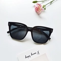 Classic black oversized sunglasses with metal rivet details and dark lenses for beach style - Black