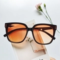 Oversized black square frame sunglasses with orange gradient lenses and metal rivets - Sunset Red