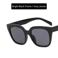 Stylish square oversized sunglasses featuring a shiny black frame with grey lenses - Glossy Black/Grey Lens