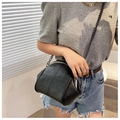 Detail of black crossbody bag with cross quilting and silver metal frame and chain - Black
