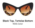 Cat eye sunglasses featuring a top black and bottom leopard print frame with orange lenses - Black and Leopard Print