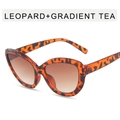 Cat-Eye-Sonnenbrille im Oversize-Look mit Leopardenmuster und Teeglasverlauf - Leopardenmuster Rahmen Verlaufsgrad Tee Linsen