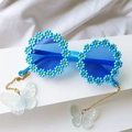 Occhiali da sole bimbi azzurri con fiori margherite e ciondoli a farfalla magici - Blu