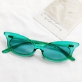 Stylish green transparent cat eye sunglasses with matching lenses on white fabric - Green
