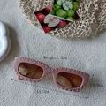 Pink rectangular sunglasses with wave texture frame and measurements 14.5cm by 2.8cm - Pink