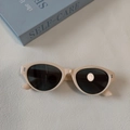 Occhiali da sole cat-eye in resina con montura nude e lenti grigie scure - Bianco Sporco