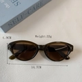 Olive green cat eye sunglasses with translucent frames and retro silver dots decor - Brown