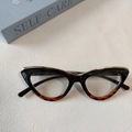 Lunettes œil de chat rétro avec monture noire, bordure dorée et touches écaille - Noir Écaille Séparé Lentille Claire