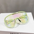 Detail of neon green sports sunglasses with iridescent lens and silver bridge bar - Yellow