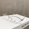 Detail of silver cat-eye metal frame glasses with anti-blue light and UV 400 lenses - Silver Frame Clear Lenses