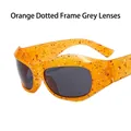 Y2K futuristic orange spotted sunglasses frame with grey lenses in athletic style - Orange Spotted Frame Grey Lens