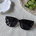 Square black sunglasses with thick frames and golden rivet details on the corners - Black