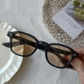 Vintage black square sunglasses with light tawny lenses and classic metal rivet accents - Clear Grey Champagne