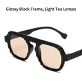 Übergroße Wellenform-Sonnenbrille in glänzendem Schwarz mit hellbraunen Gläsern - Schwarzer Rahmen Helle Teefarben Gläser