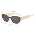 Detailed view of beige cat-eye sunglasses with dimensions 4.3cm height and 14.3cm width - Beige