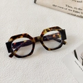 Detailed view of vintage tortoiseshell geometric sunglasses with model size specs - Tortoise Green White Lens