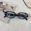 Fashionable hexagonal sunglasses with dark tortoiseshell frames and light blue lenses - Grey Marble with Blue Lens