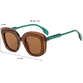 Retro oval sunglasses with dark brown patterned frames and translucent green temples - Demi