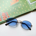 Retro oval sunglasses with golden metal frames and blue lenses for a vintage style - Blue