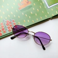 Retro oval sunglasses featuring purple gradient lenses and a thin gold metal frame - Purple