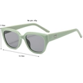 Sage green square sunglasses with silver geometric accents and dark gray lenses - Green