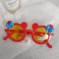 Detailed close-up of red bear-ear kids sunglasses with UV400 yellow transparent lenses - Cartoon Mouse Style