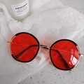 Detail of red transparent lenses with retro gold metal and black frames for kids - Semi-Rimless Round Retro Style
