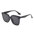 Detail view of large square black sunglasses with dual metal studs and dark grey lenses - Black Frame Grey Lens