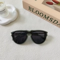 Close-up of stylish dark green oversized square frame sunglasses with UV lenses - Transparent Green