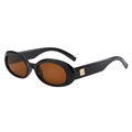 Close-up of retro oval sunglasses with thick black frame and gold metal temple detail - Black Frame Tea Lens