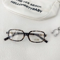 Detailed shot of leopard print sunglasses with UV 400 protection on a canvas background - Cream Marbled Clear Lens