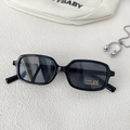 Detailed shot of retro rectangular sunglasses with UV400 protection and CE mark labels - Black and Gray