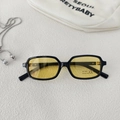 Detail of retro square kids sunglasses with yellow lenses and UV400 protection logo - Black Frame Yellow Lens