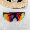 Detail of kids sports sunglasses with vibrant red and orange mirrored lenses on white fabric - Black Frame Red Mirrored Lens