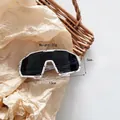 Lightweight 20g kids sports sunglasses with white frame and red paint splash detail - White Splash Grey Lens