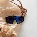 Detail of kids sports sunglasses with black splash frame and large blue purple coated lens - Black Frame Blue Mirrored Lens