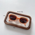 Close-up of foldable orange children sunglasses showing precise 14cm width dimensions - Orange