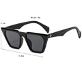 Occhiali da sole cat-eye oversize neri con montatura piatta e borchie a stella - Nero Lucido